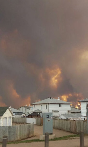 Upshall, Hitchcock keep nervous eye on Fort McMurray fire